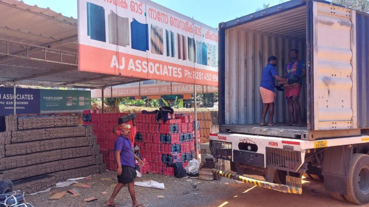 Family admiring their new home under construction with new roofing 
