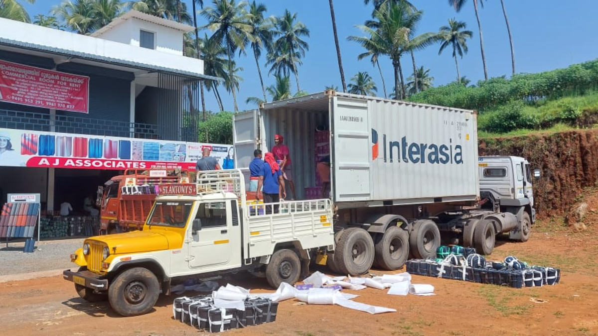 Construction site with contractors working on a roof